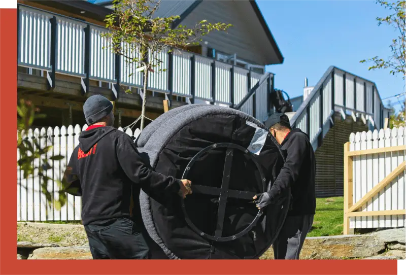 moving furniture two men carrying a large item